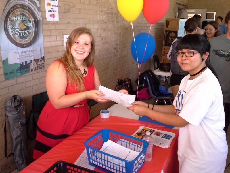 Officers handed out applications at the Club Palooza